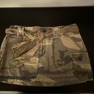 Cameo mini skirt. Pockets on side and back. No holes or stains.